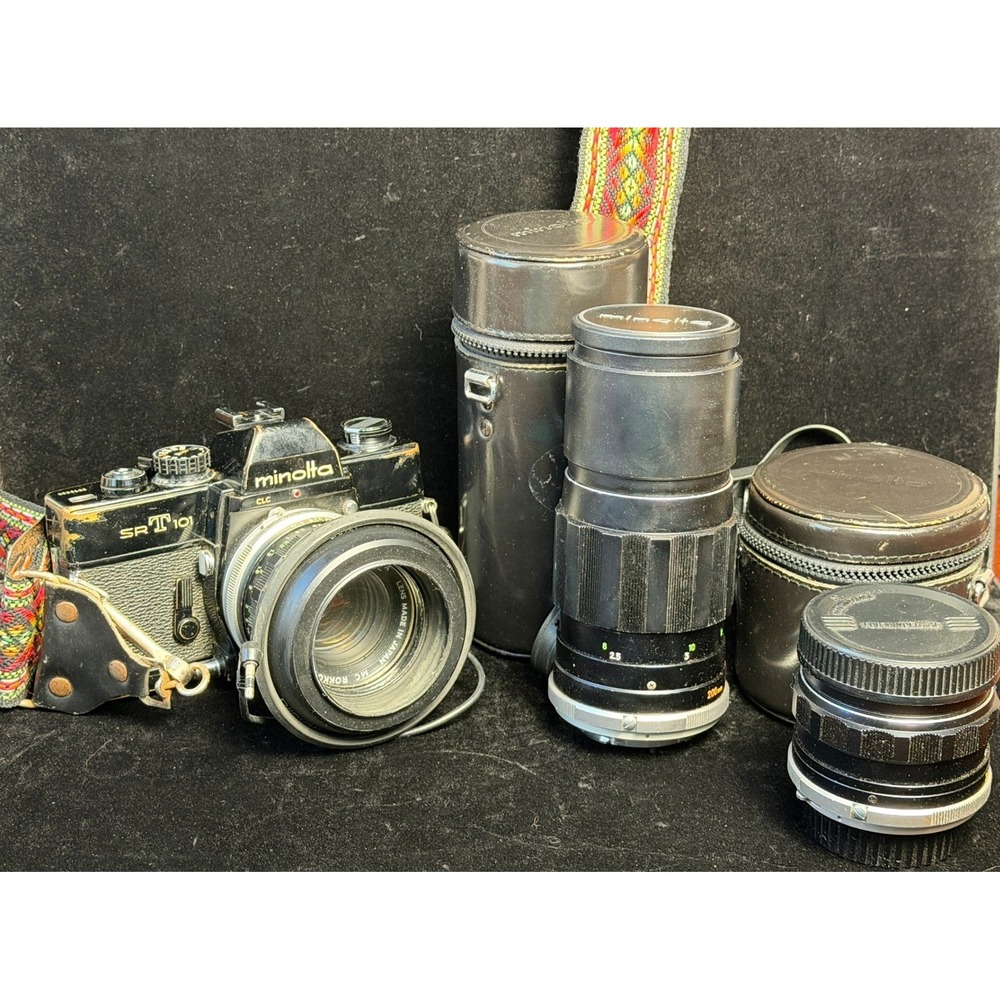 Minolta SRT 101 35mm Film Camera: with 55mm, 28mm, 200mm Lenses, Cases and Strap